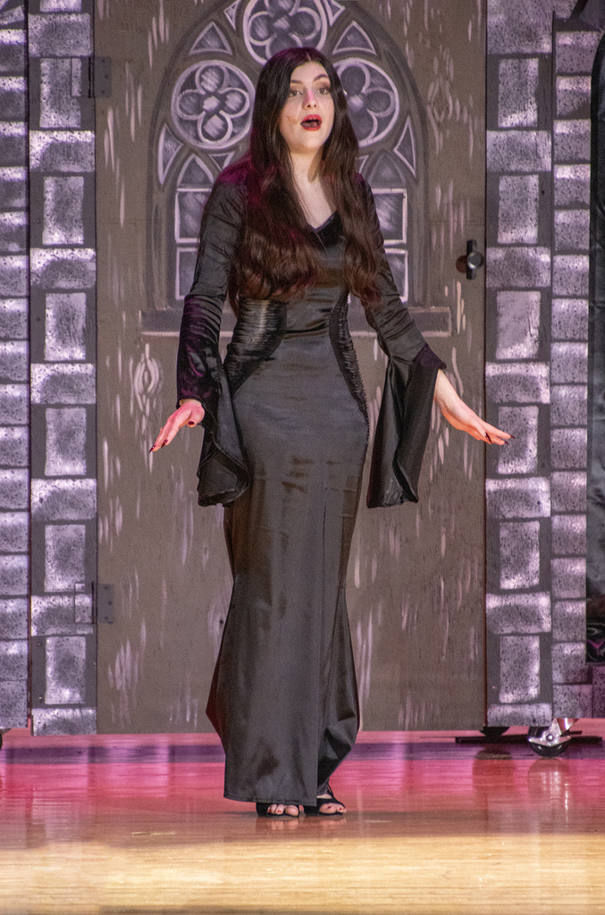 Morticia singing