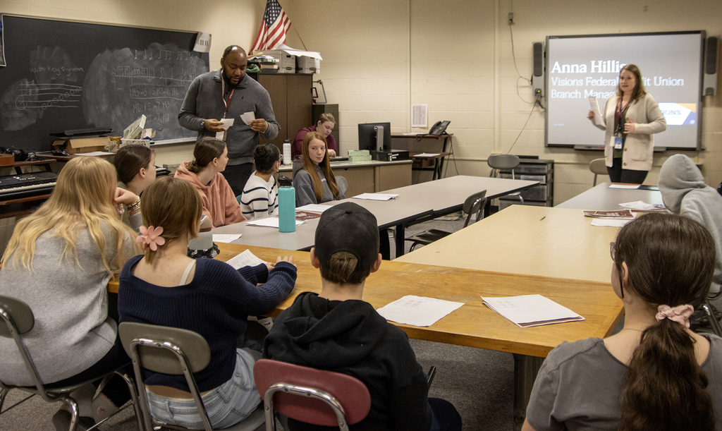 credit union employees speak to students