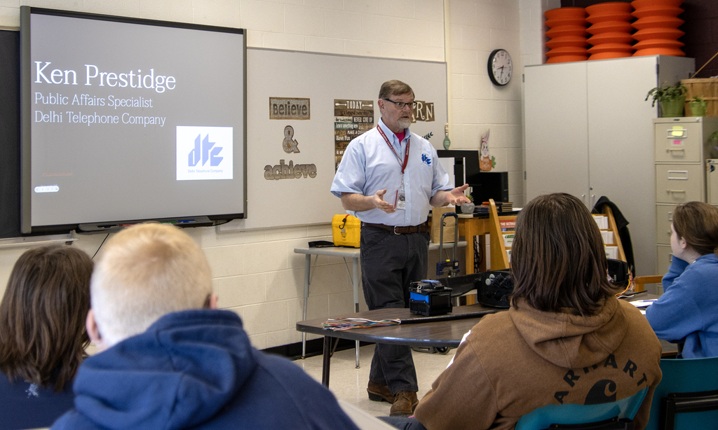 phone company speaks to students