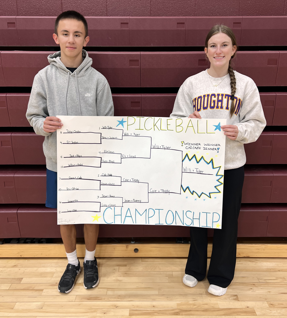 Will Mokay and Tyler Abts pose with the Pickleball Championship bracket