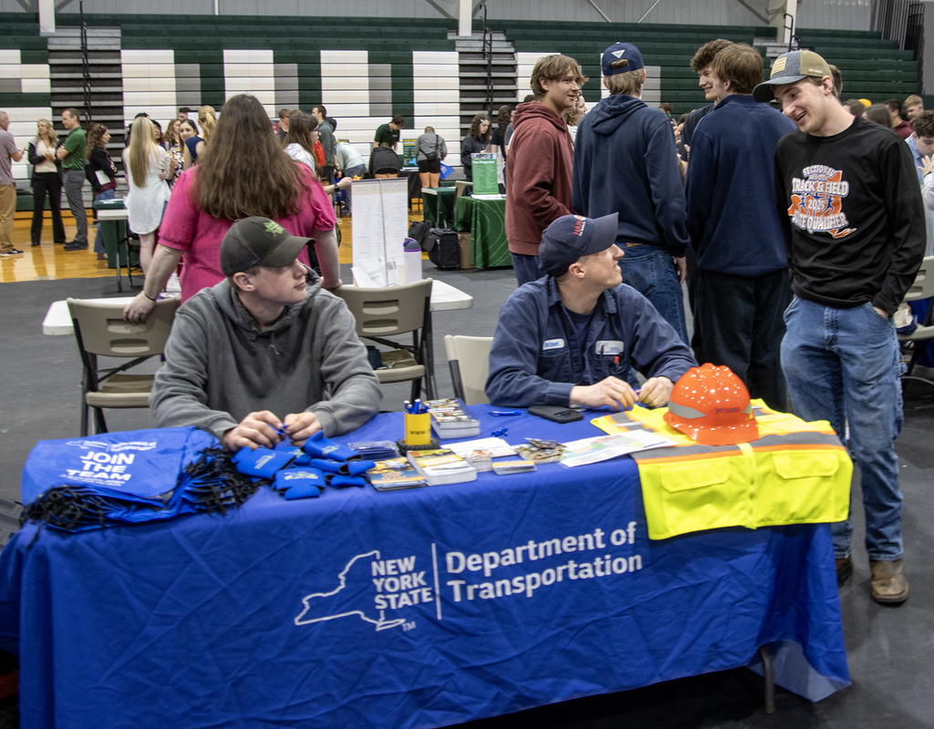 student talks to DOT representatives
