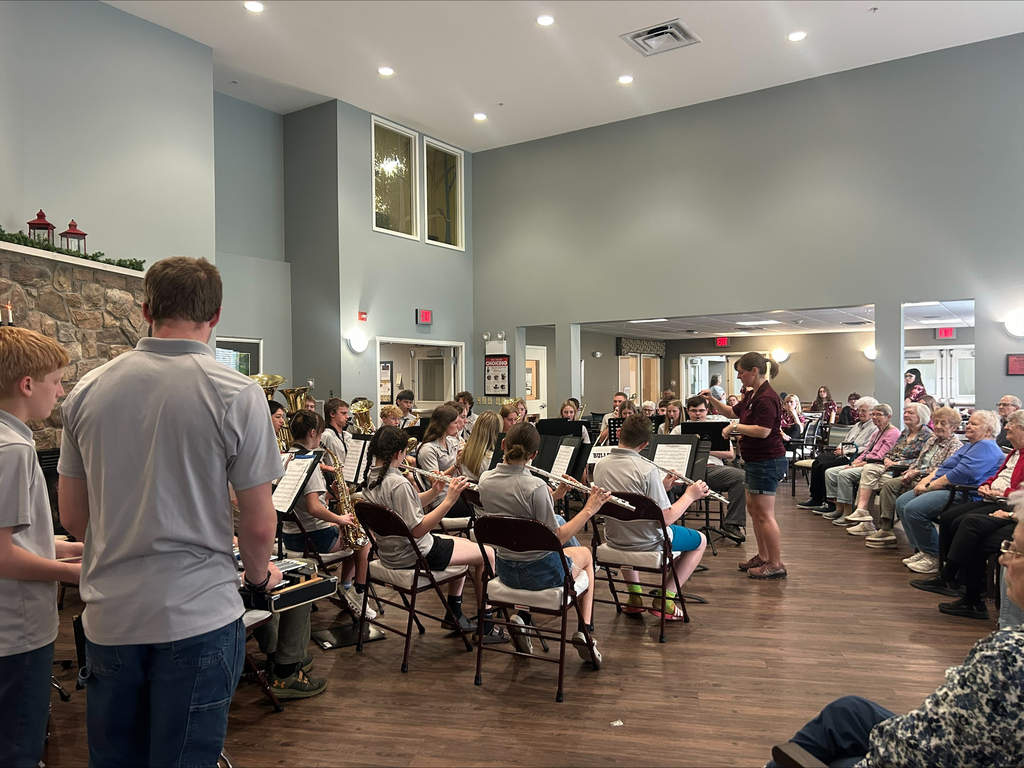 Concert band performing at The Plains