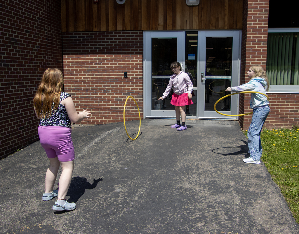 students with hula hoops