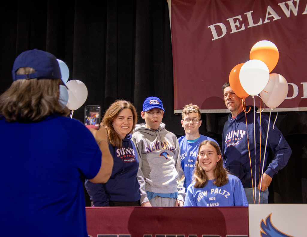 Olivia Kruppo poses with family members