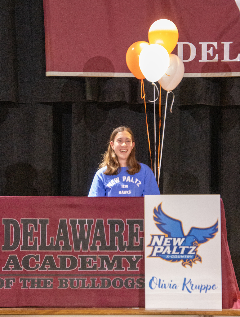 Olivia Kruppo with New Paltz sign