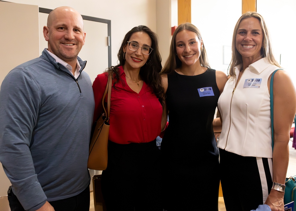Luciane Smith and her family with Mrs. Haight