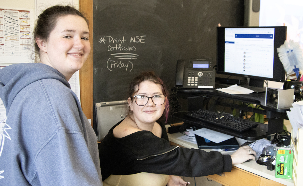 2 students smile in Mrs. Tucker's room