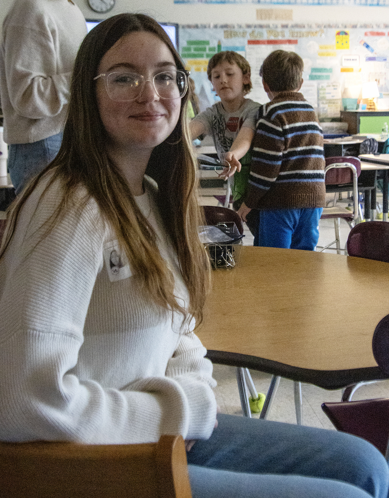 Student smiles in 3rd grade classroom