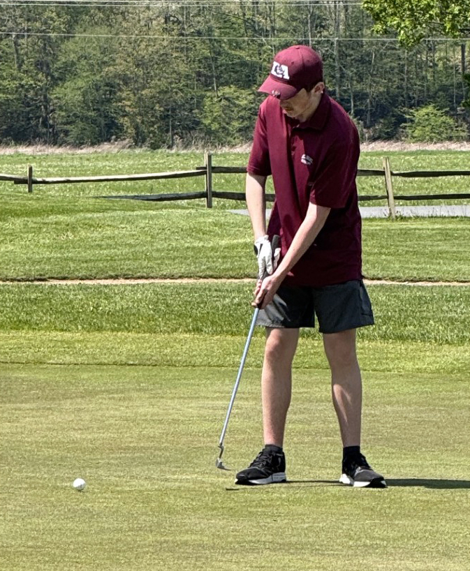 DA student on golf course