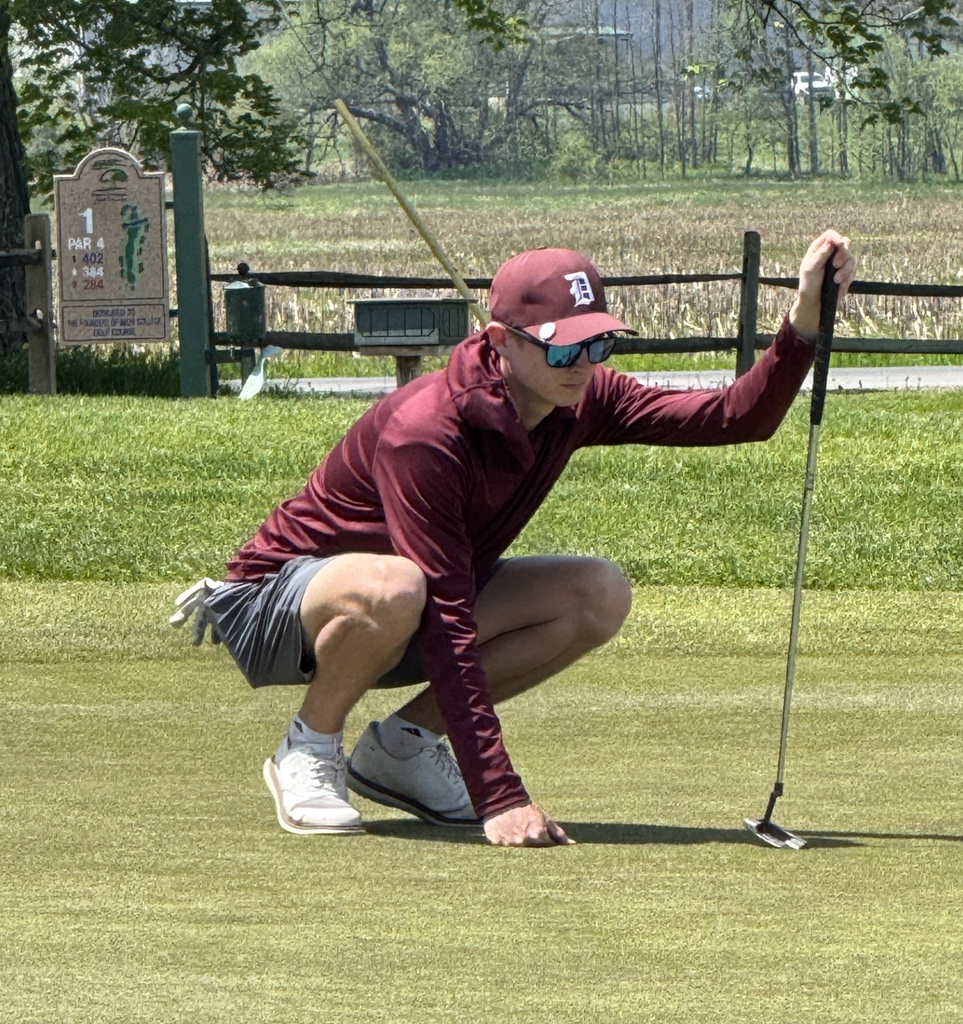 DA student on golf course