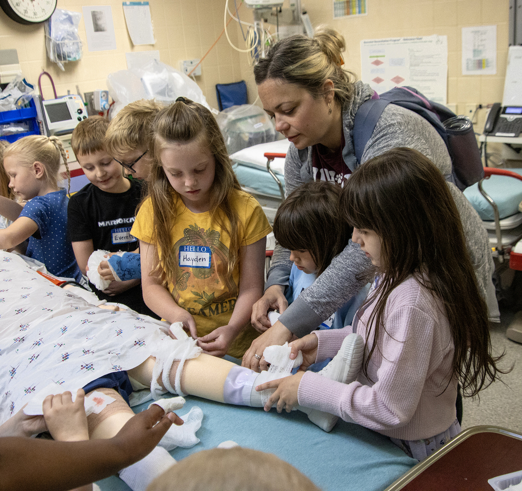 students bandaging in the trauma room