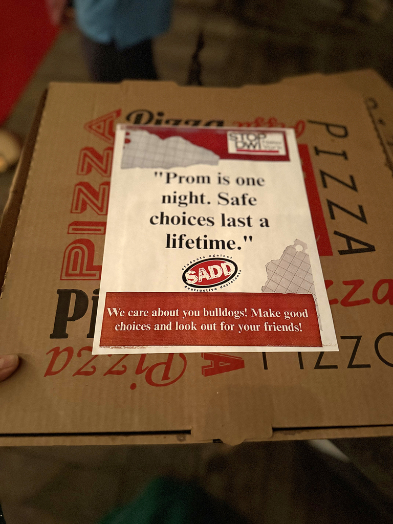 Pizza box with a message on it: "Prom is one night. Safe choices last a lifetime."
