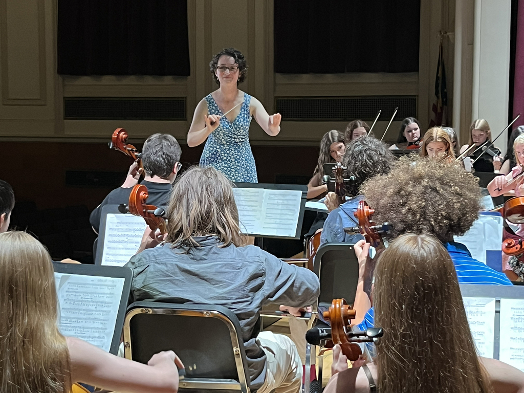 Mrs. Gibson conducting
