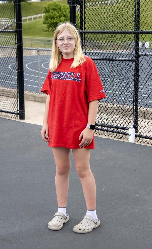student wearing a Cornell shirt