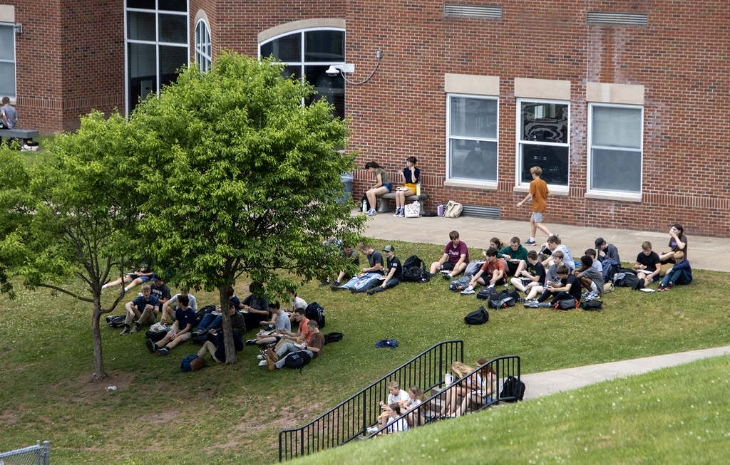 students enjoy the barbeque