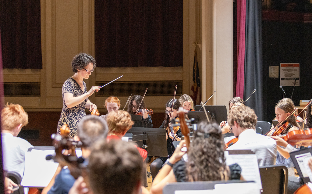 Mrs. Gibson conducting