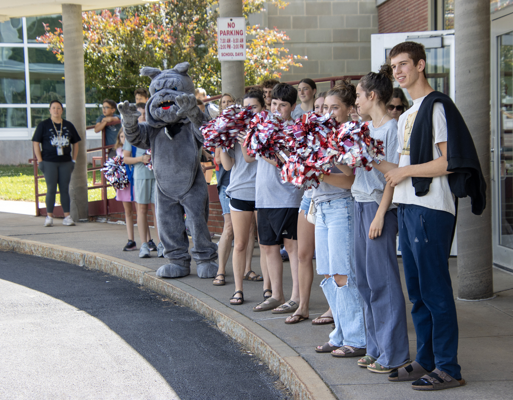 SADD students cheer for elementary students as they leave the school