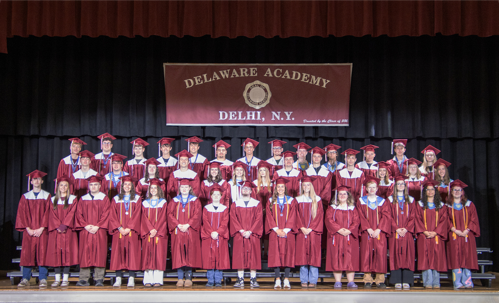 group photo of the Class of 2026, Delaware Academy, wearing caps and gowns