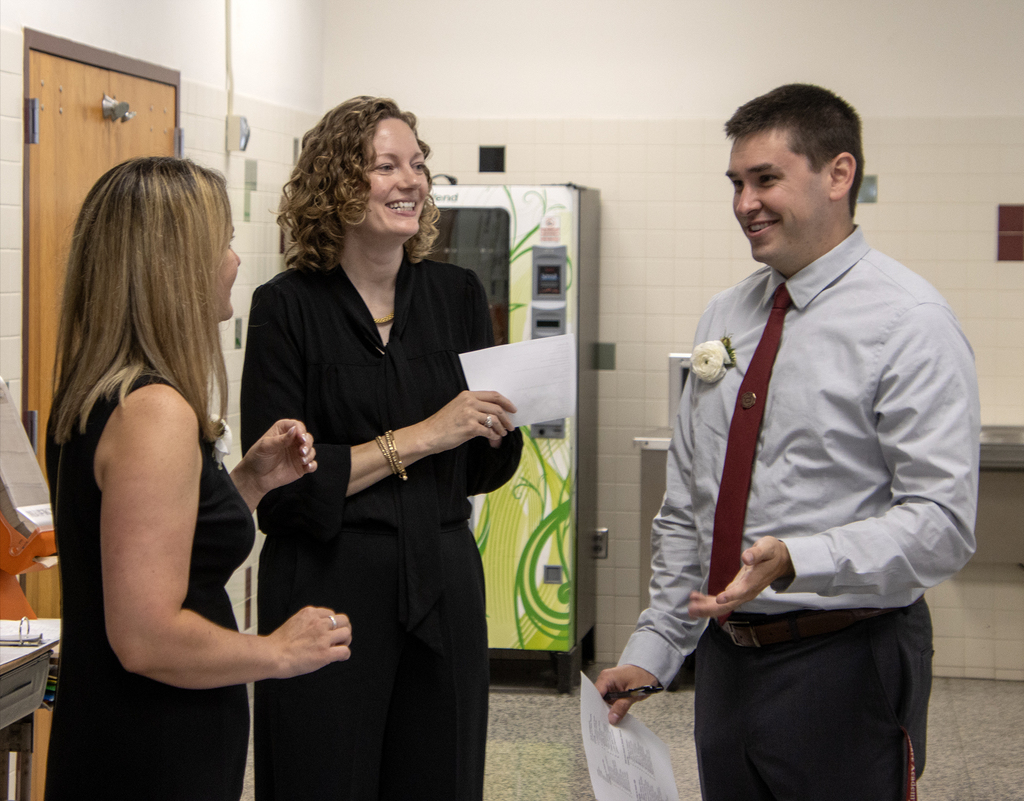 Ms. Trask, Mrs, Kane and Mr. Layman laughing together