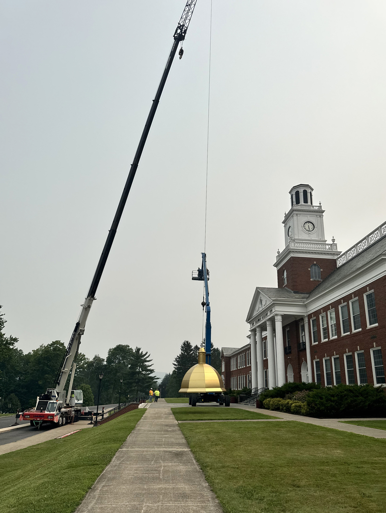 dome being moved by crane