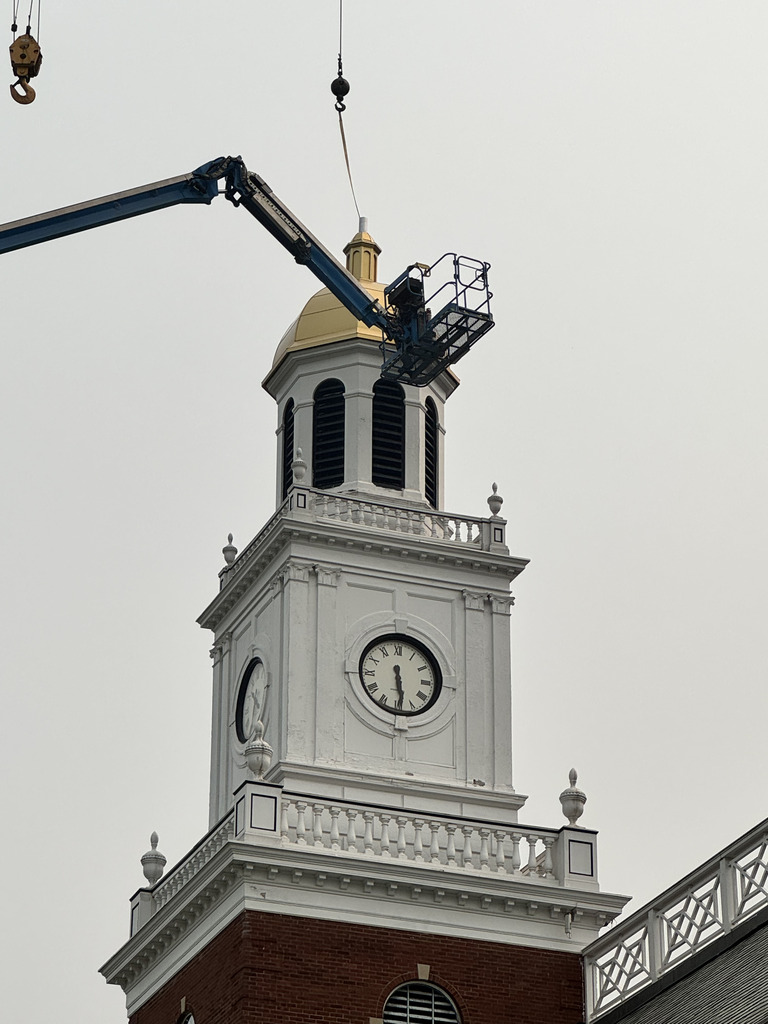 dome in place on tower; lift is next to tower