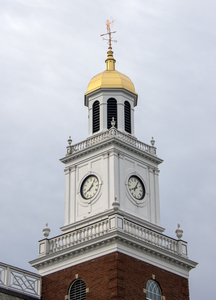 view of clock tower withnew gold dome and weather vane