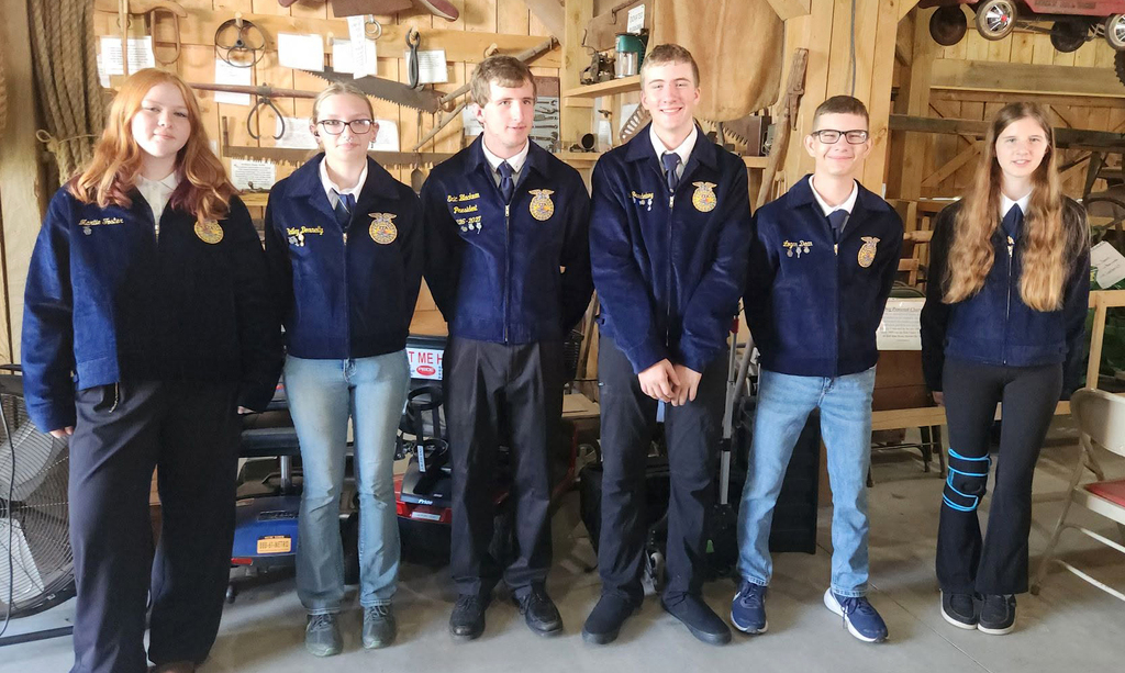 6 Delaware Academy FFA members in FFA jackets
