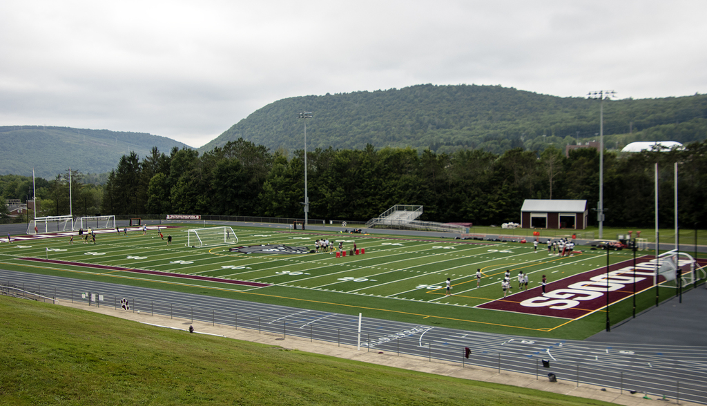soccer and football practice taking placce on Dave Kelly Field