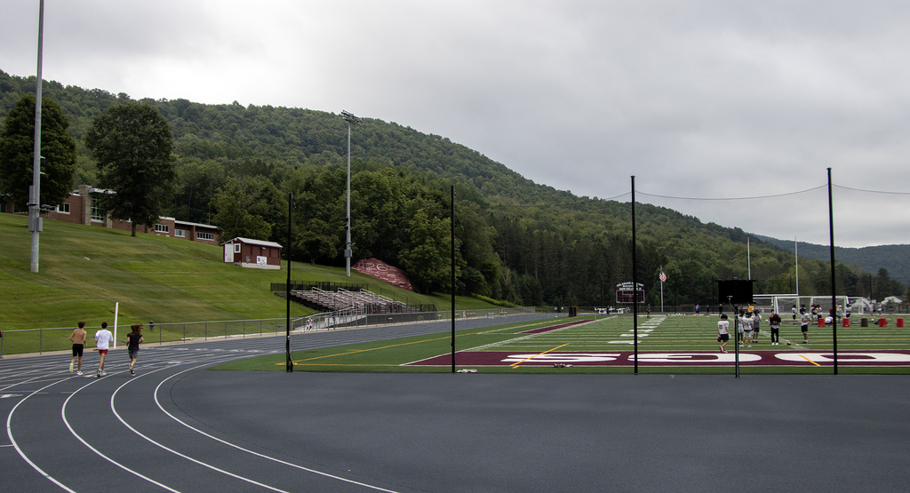 cross country runners on the track
