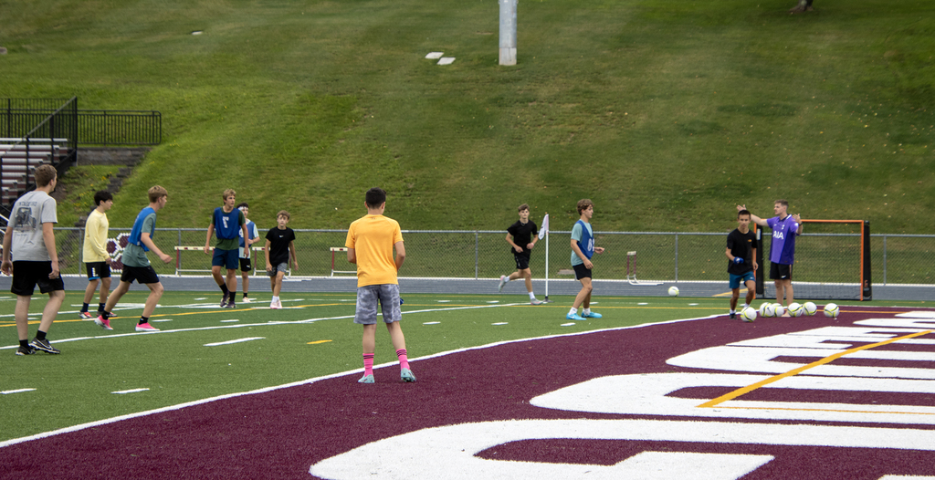 boys soccer practice taking place on Dave Kelly Field