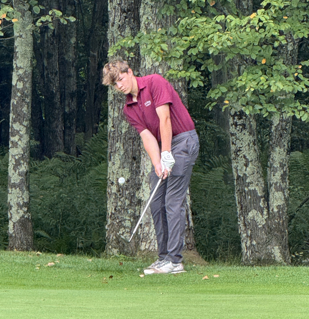 student golfing