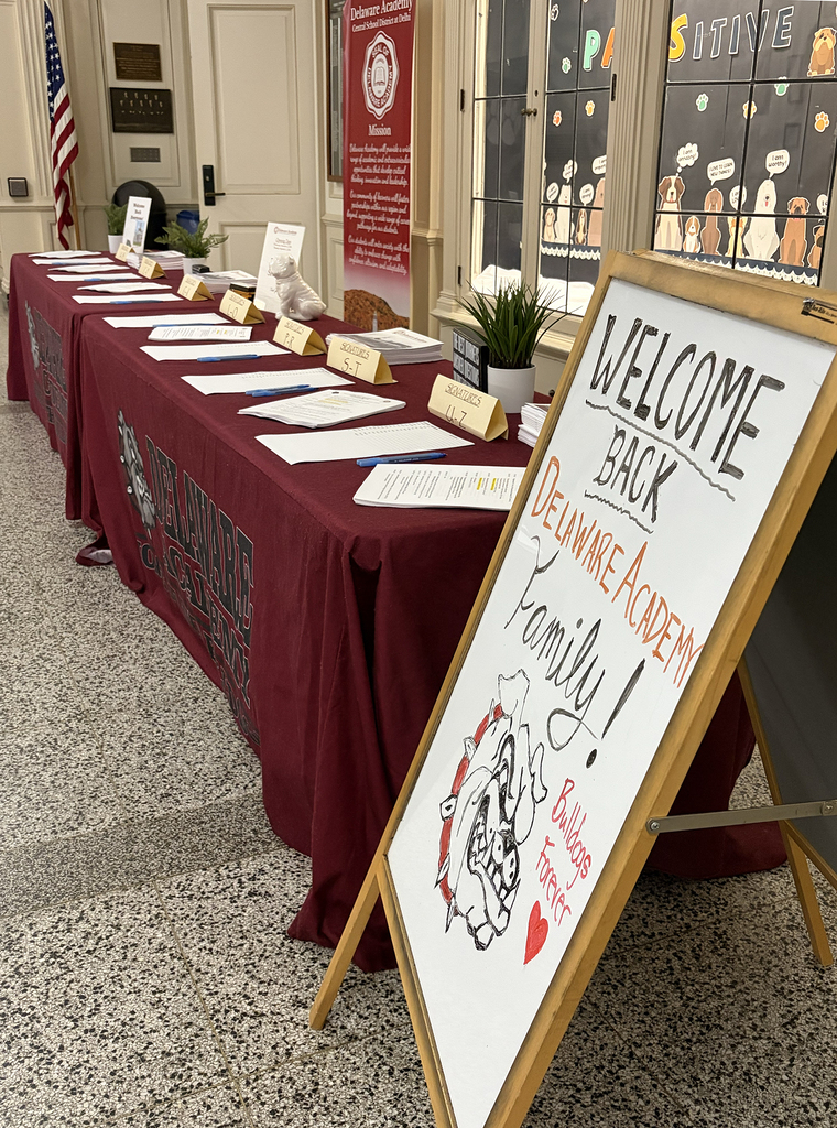 Welcome back Delaware Academy family! sign at registration table