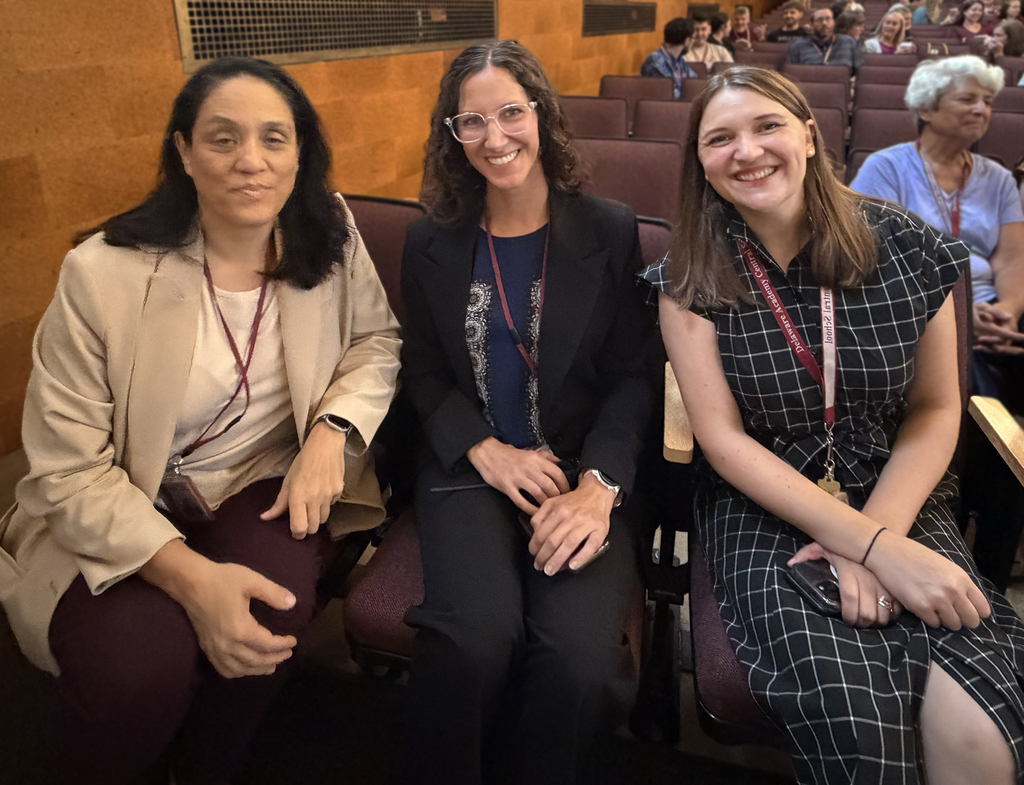 middle school and elementary principals and specail education director sitting in the auditorium