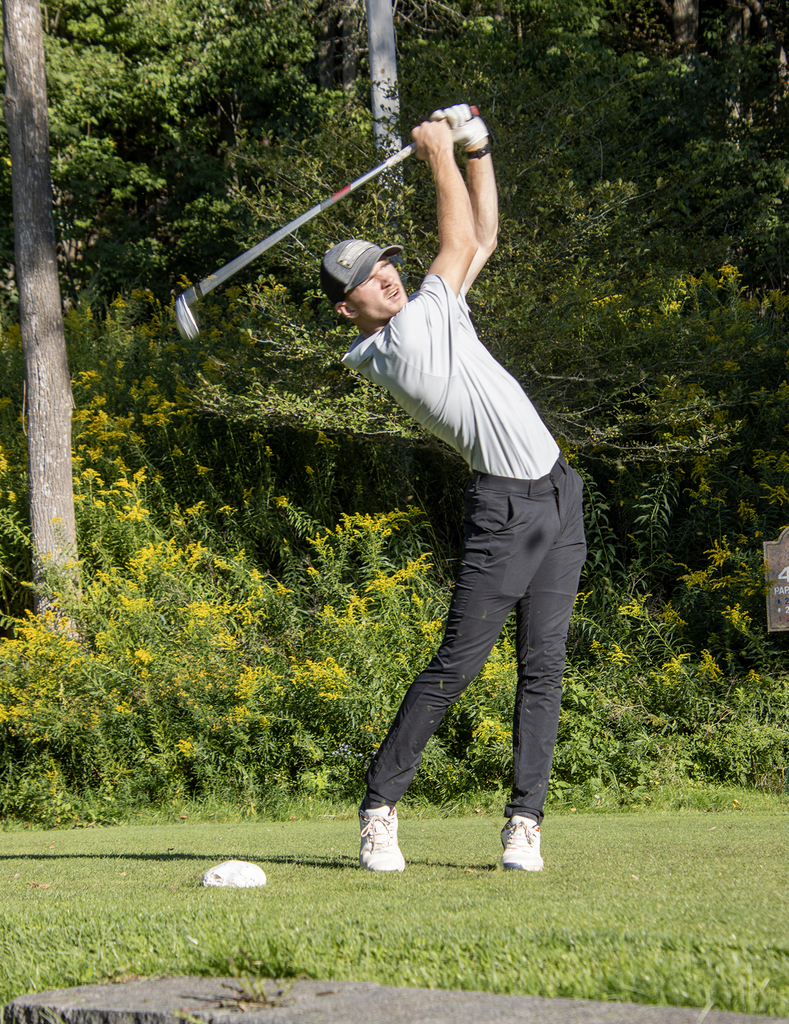Golfer Cameron Winner, having just shot from the tee.