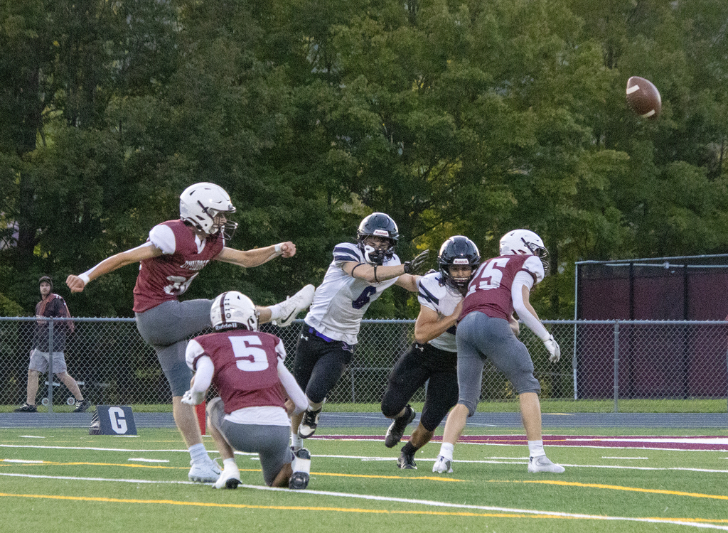 kicker, after kicking the ball