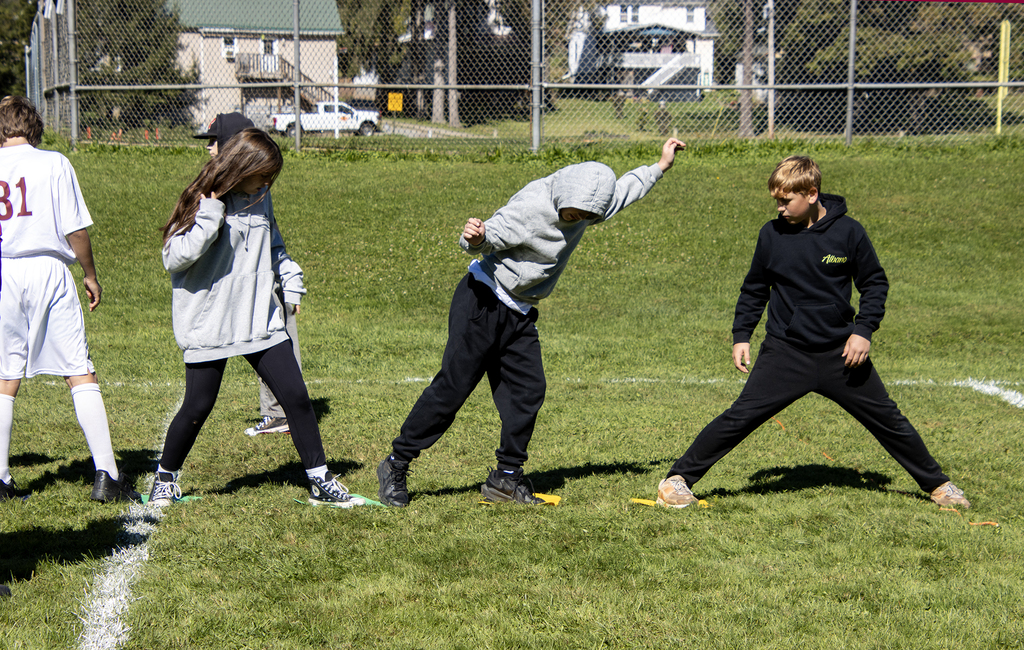 4 students participating in a team building activity