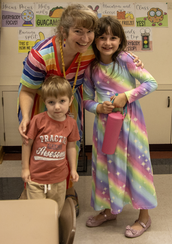 Mrs. Lane poses with her children