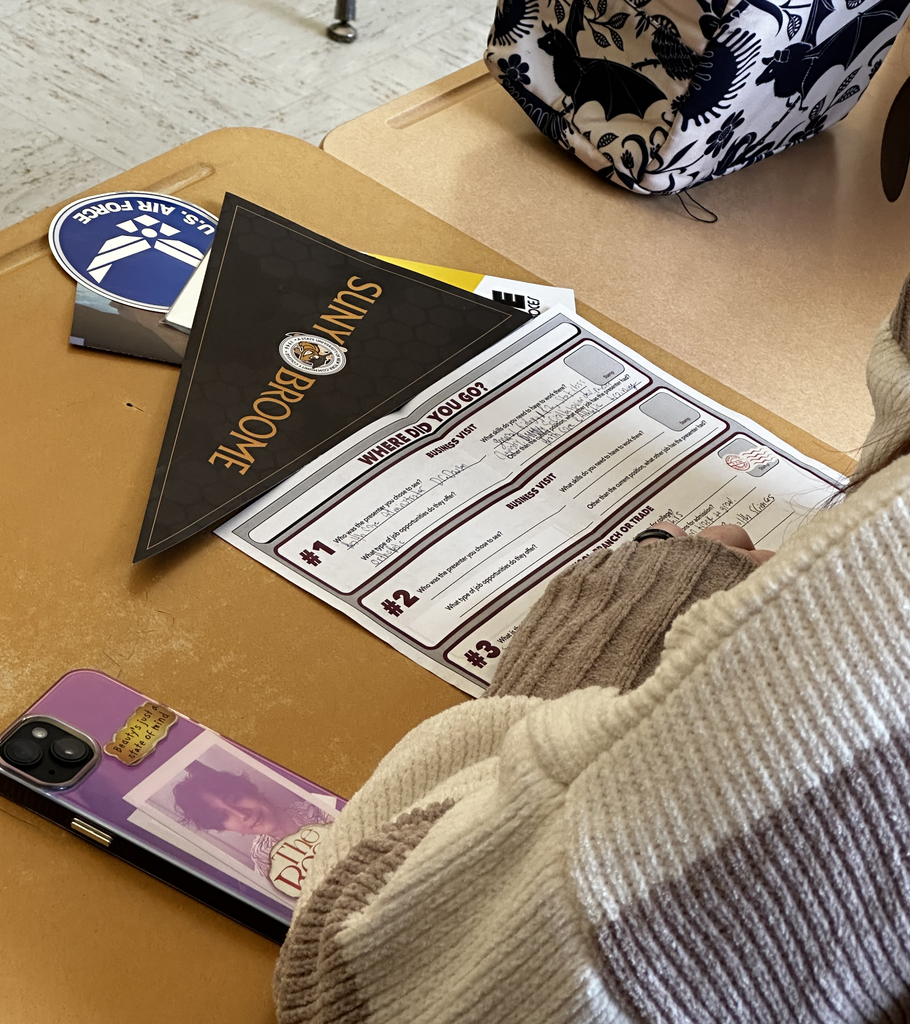 student filling out a form at the career fair