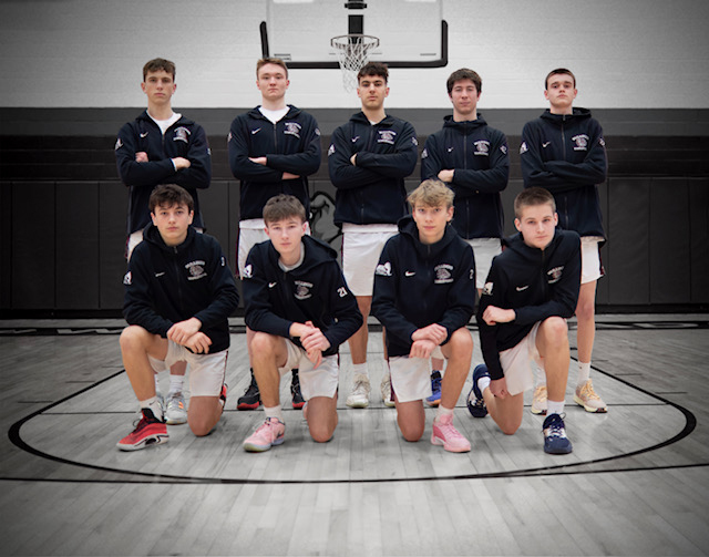 team photo of 9 boys basketball team