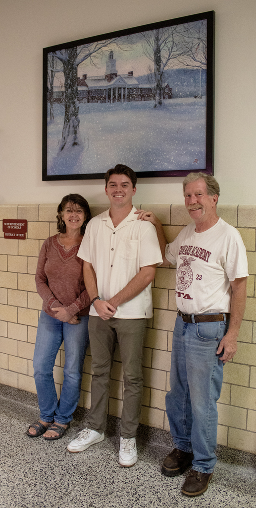 Kathleen Taylor, and John Taylor with their son Alex (middle)