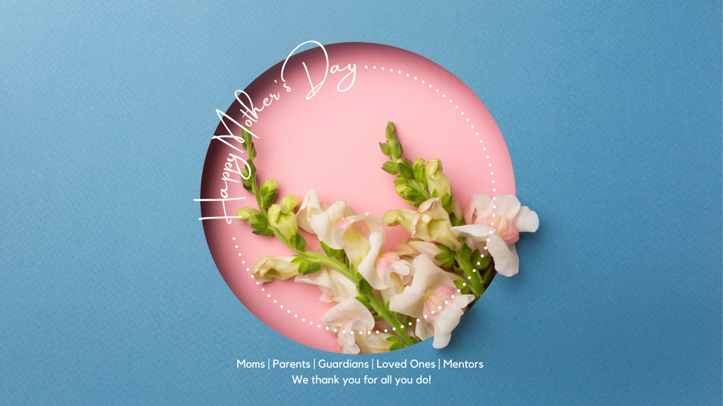 Pink plate with floral arrangement of white carnations and greenery on blue background. 