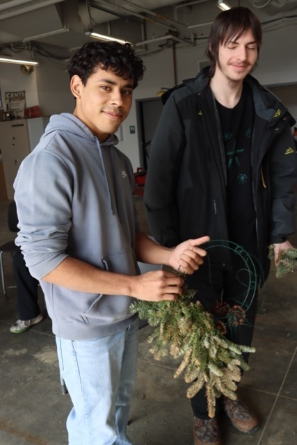 Student with wreath