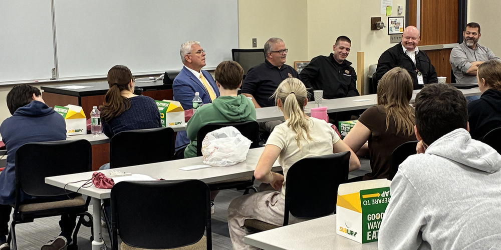 panelists engage with students at career event