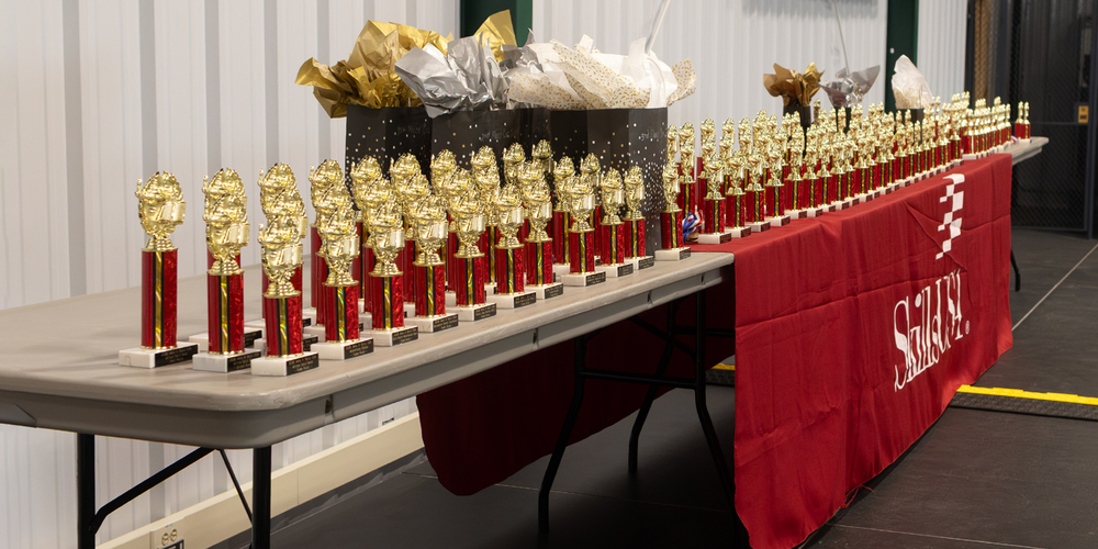 table full of trophies