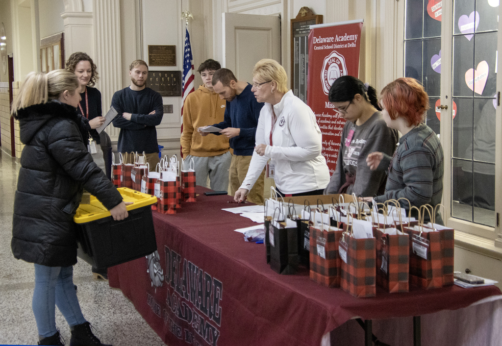staff and students welcome recruiter to the event