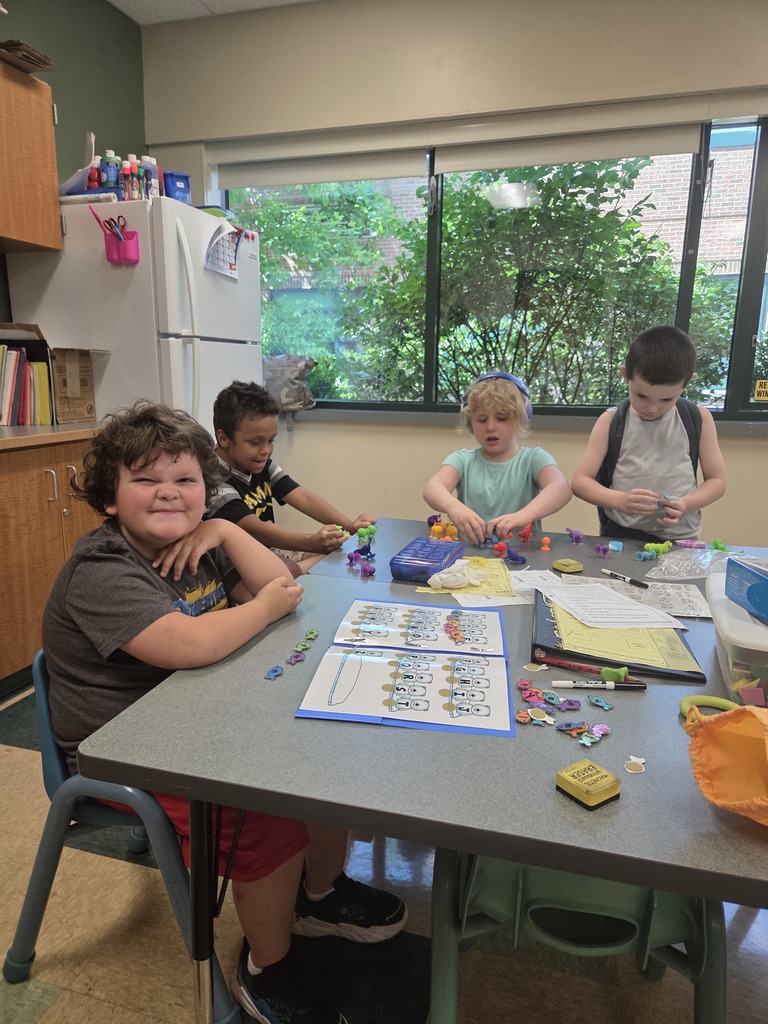 4 students work at a table