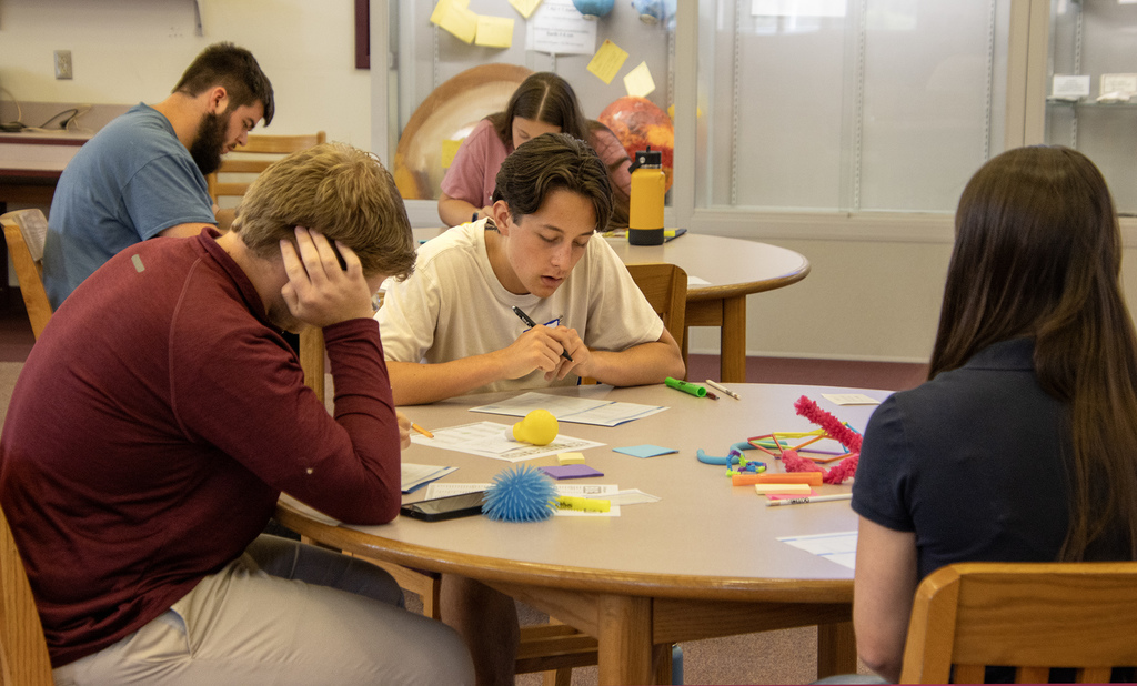 students working at tables