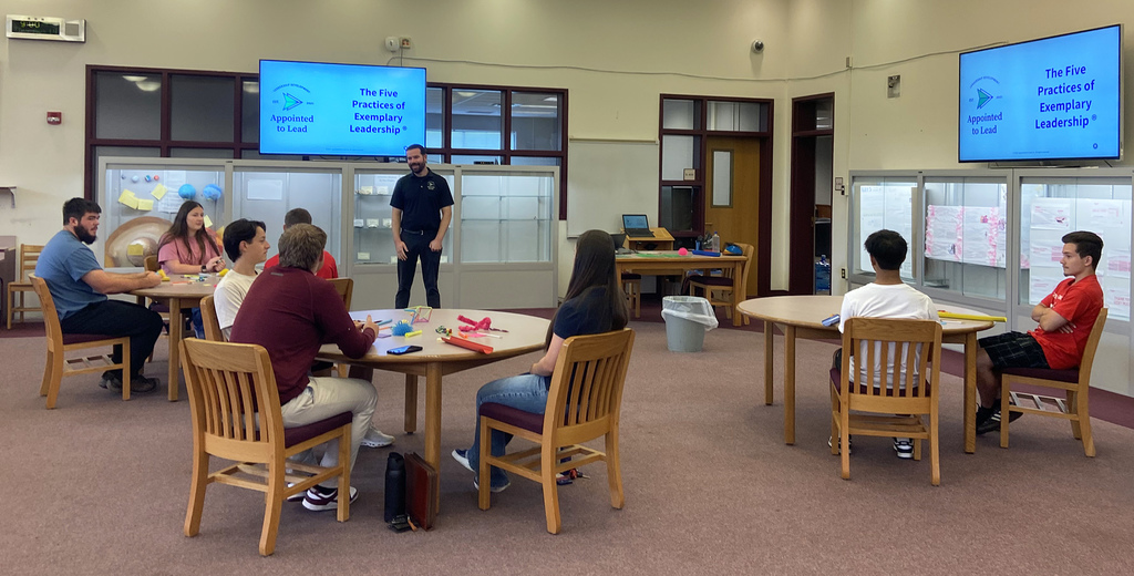 presenter speaks to students