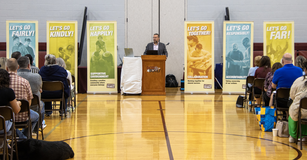 Mike Rullo speaks at lectern