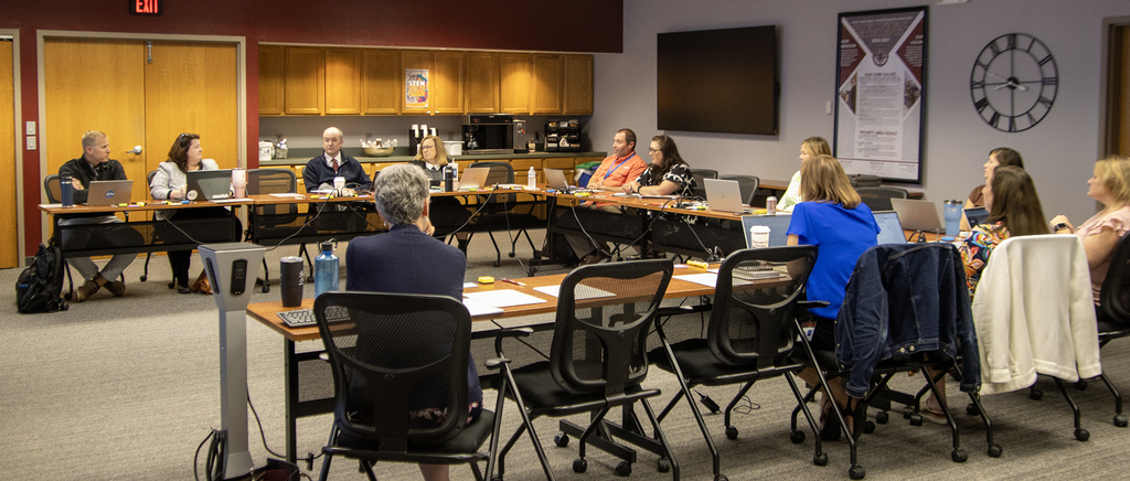 steering committee members around a table